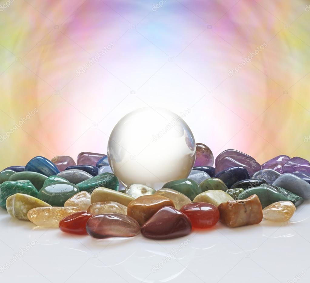 Crystal ball surrounded by healing crystals 