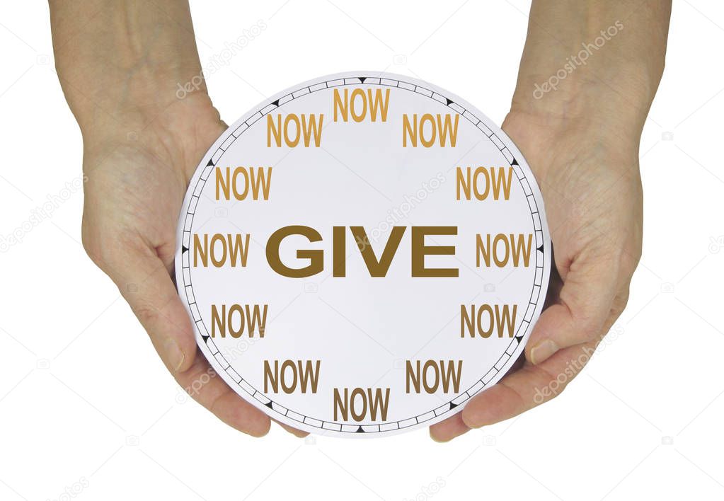 Please GIVE what you can NOW  - female hands holding a clock with no hands that has NOW in place of the numerals and GIVE instead of hands isolated on a white background 