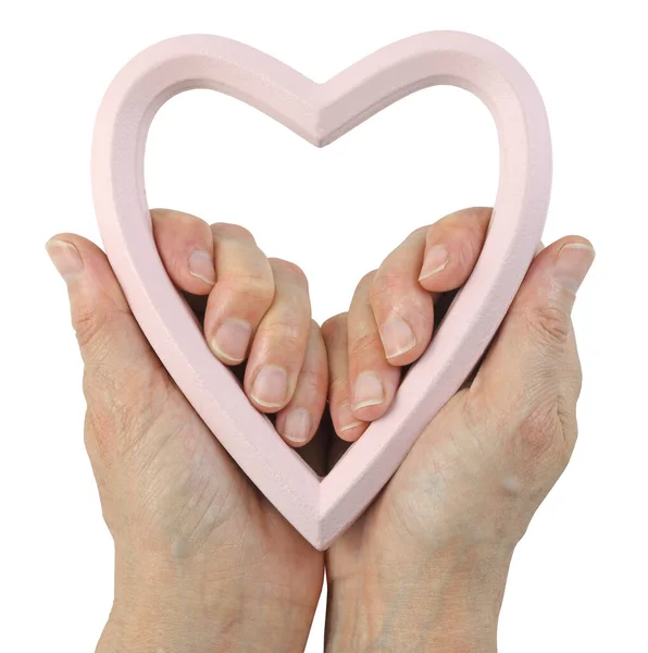 Aşkımız Bizim Ellerimizde Soluk Pembe Bir Kalp Taşıyan Kadın Elleri — Stok fotoğraf