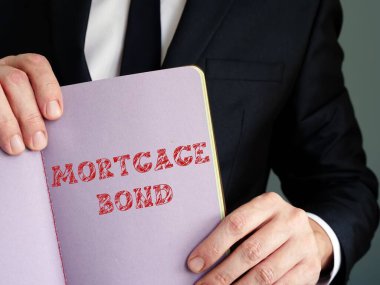 Finansal kavram, üzerinde yazı olan ipotek senedi anlamına gelir..
