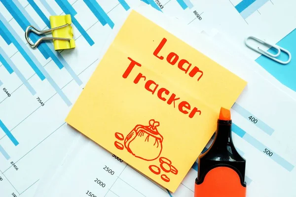 Loan Tracker  phrase on the piece of paper.