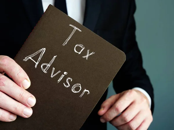 Conceptual photo about Tax Advisor with handwritten phrase.