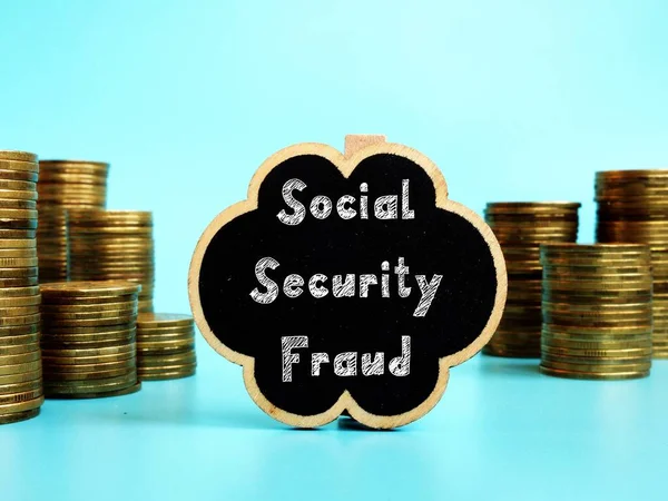 Business concept about Social Security Fraud with sign on the piece of paper.