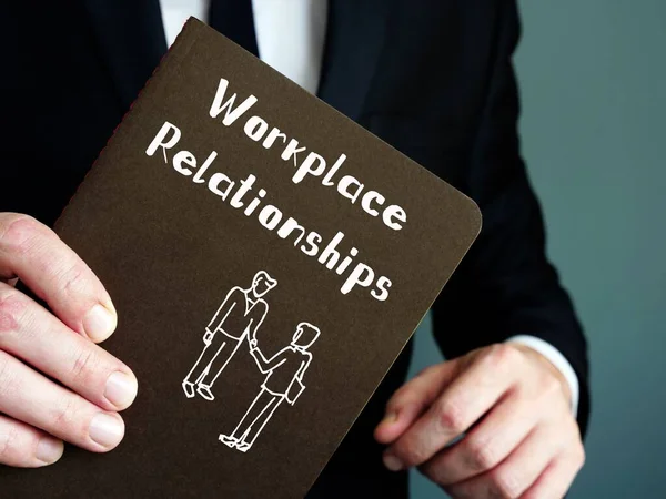 Career concept about Workplace Relationships with inscription on the sheet.