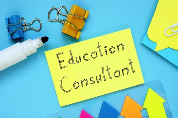 Educational concept meaning Education Consultant with inscription on the piece of paper.