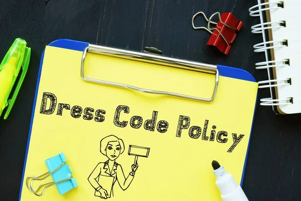 Business concept meaning Dress Code Policy with phrase on the page.