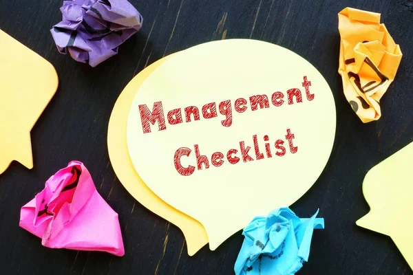 Career concept about Management Checklist with phrase on the sheet.