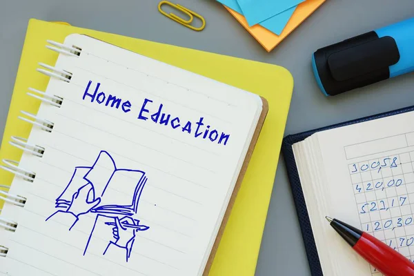 Business concept about Home Education with inscription on the sheet.