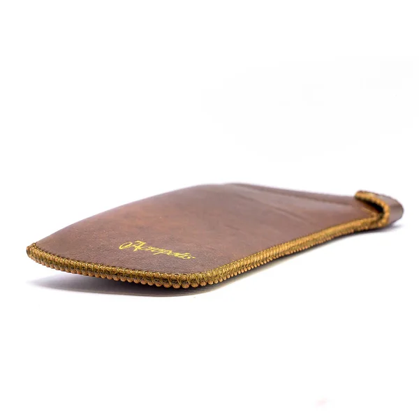 Genuine leather glasses case on white background isolated