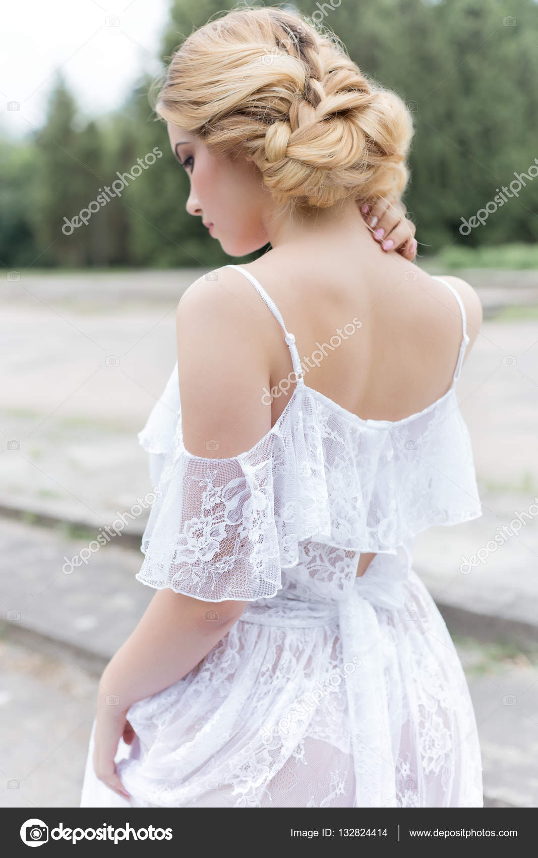 Beautiful Young Sweet Blonde Girl With A Wedding Bouquet In The Hands Of The Boudoir In A White Dress With Evening Hairstyle Walks Near The Ruins Photo By Beautiful Young Sweet Blonde Girl With A Wedding Bouquet In The Hands Of The Boudoir In A White Dress With Evening Hairstyle Walks Near The Ruins Photo By