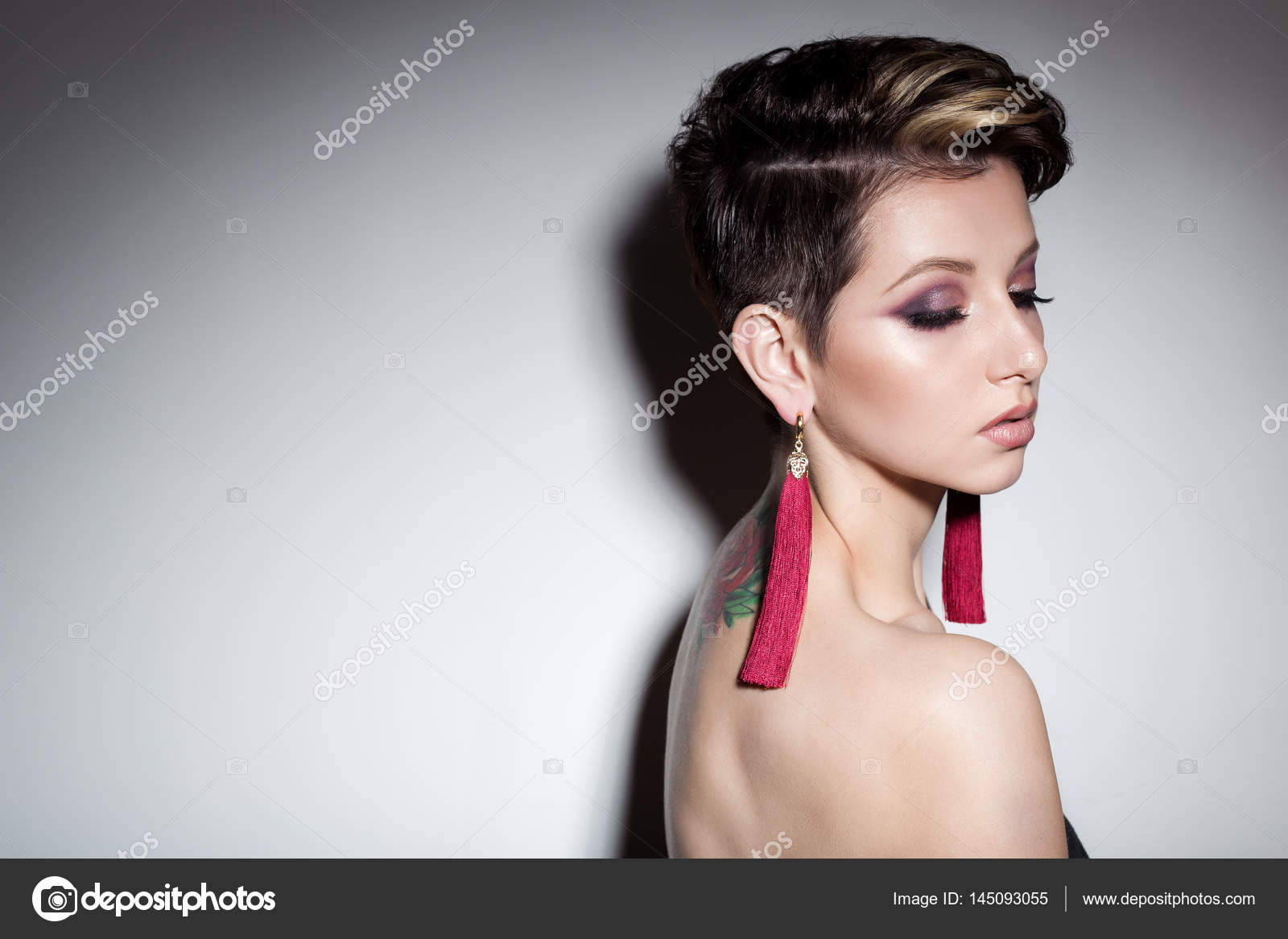 Beautiful Sexy Sensual Young Girl With Short Hair With Bright