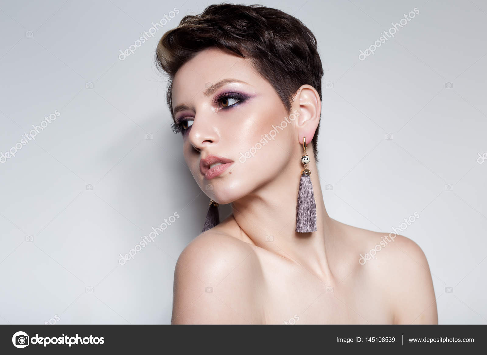 Beautiful Sexy Sensual Young Girl With Short Hair With Bright