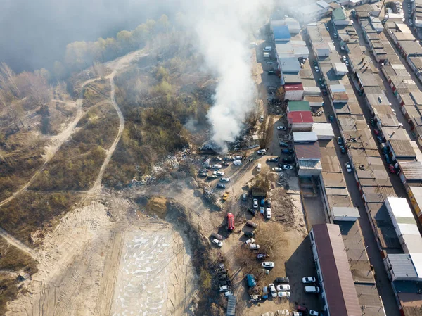 Fire near the garage cooperative. Aerial drone view.