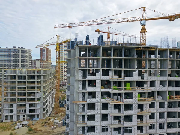 Aerial drone view. Construction site of modern residential building in Kyiv