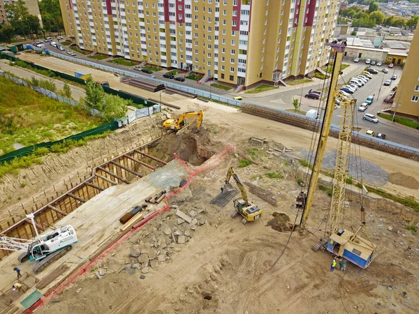Aerial drone view. Construction site near modern residential area in Kyiv