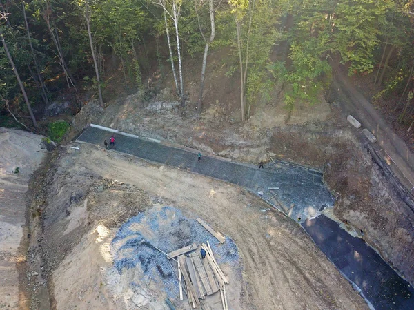 stock image Aerial drone view. Construction site among the forest