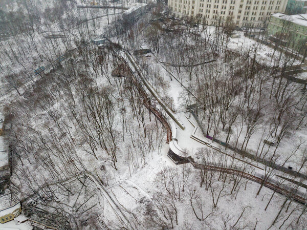 Aerial drone view. Snow-covered park in the Kyiv city