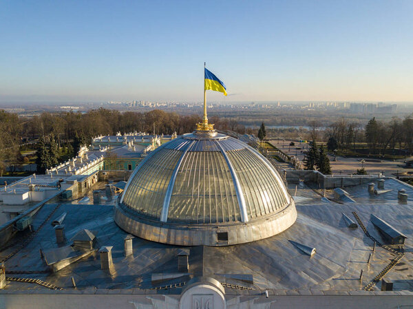 Aerial drone view. Dome of the building Verkhovna Rada of Ukraine with flag