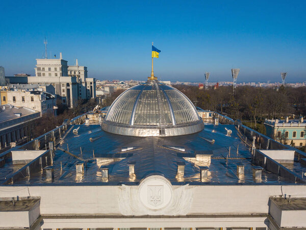 Aerial drone view. Dome of the building Verkhovna Rada of Ukraine with flag