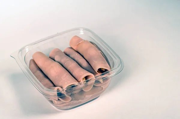 jambon şeffaf kutuda yuvarlanıyor