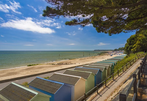 Cabanas de praia em Solent Beach, Hengistbury Head, Bournemouth, Dorse — Fotografia de Stock