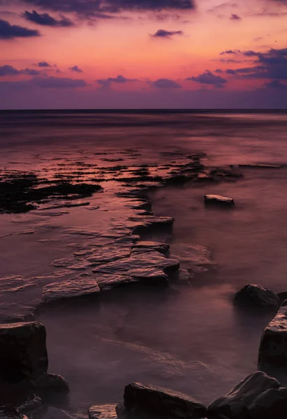 Bords Kimmeridge au coucher du soleil sur la côte jurassique — Photo