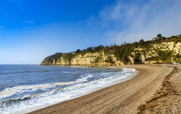 Wczesnym Rankiem Światło Słoneczne Oświetla Kamyki Plaży Piwie Devon — Zdjęcie stockowe