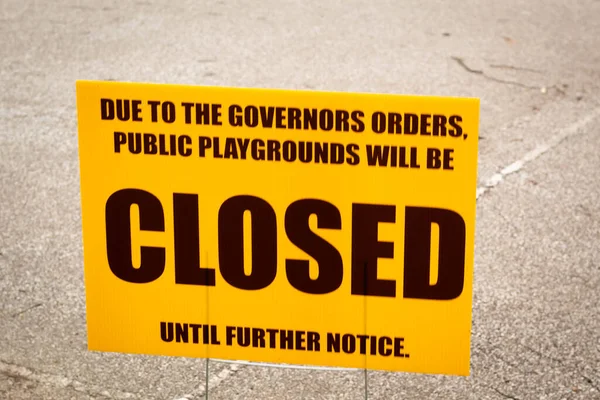 Public park closure sign posted in Ohio due to the Ohio Republican Governor orders given for a Statewide quarantine for corona virus risks