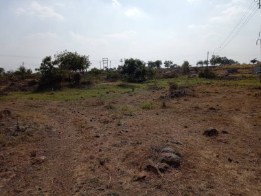 Ekinleri temizledikten sonra eski açık arazi, kara pamuk toprağı & karlı değil, yaz mevsiminde bu arazi koşulları.