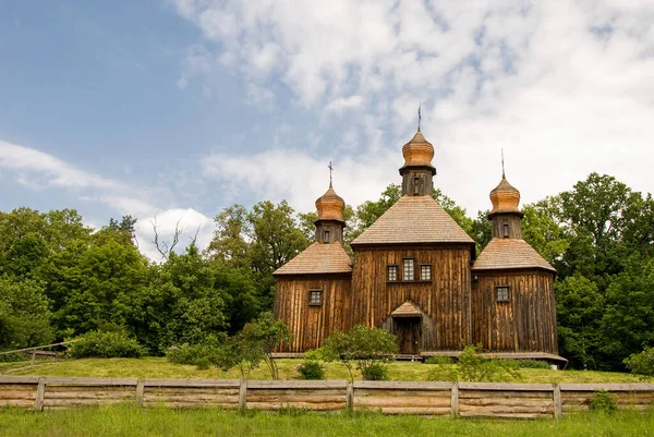 Big old wooden orthodox church. Ukraine, Pirogovo. Space for text.