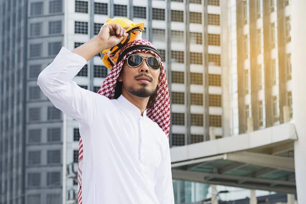 Arab Engineer construction worker holding helmet construction — Stock Photo, Image