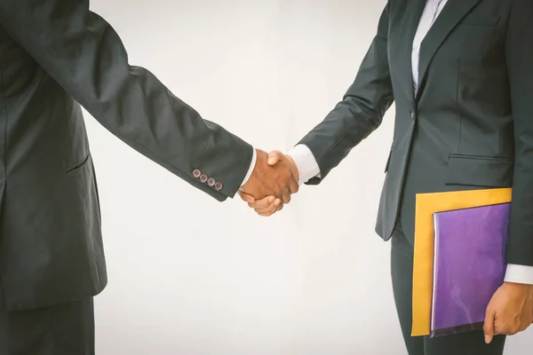 Business partnership meeting concept. Image of businessmen hands