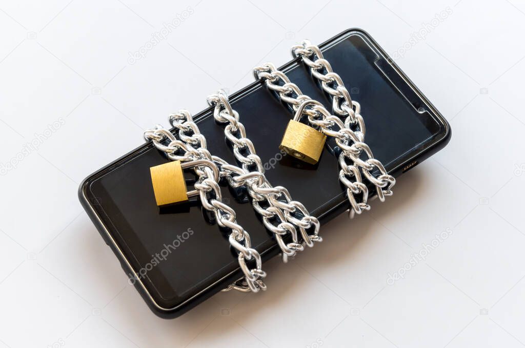 Smartphone with chain and padlock, Safety concept.