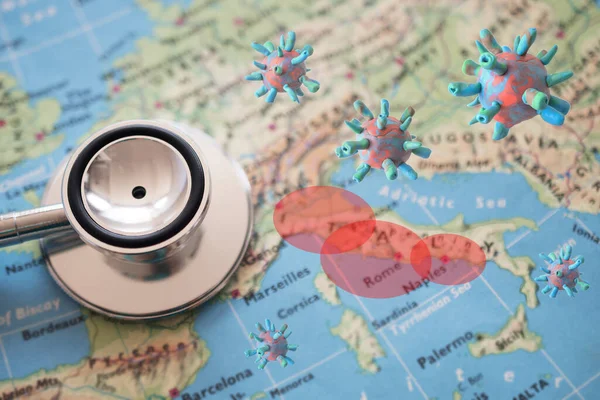 Stethoscope on Italy map background. outbreak of the virus covid-19 in Italy red zone
