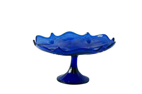 Glass vase blue for fruit. Vase on a long leg.