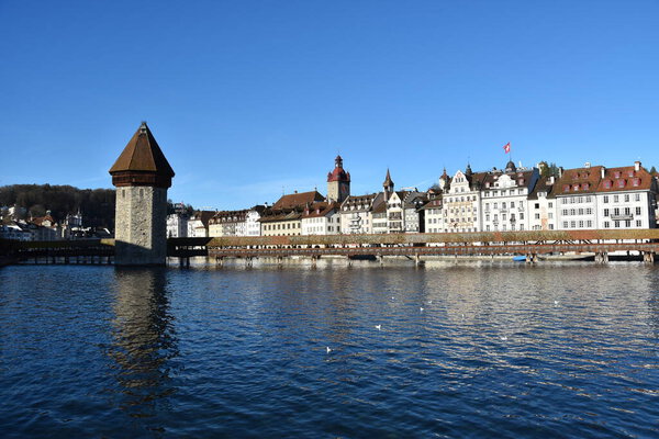 Views of the wooden bridge from luzern lake in winter