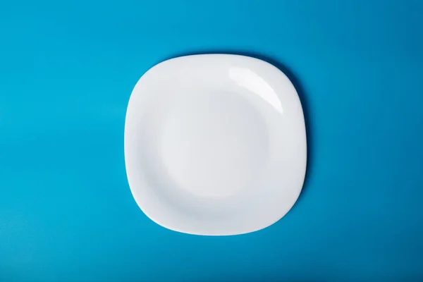 Empty White Plate Blue Background — Stock Photo, Image