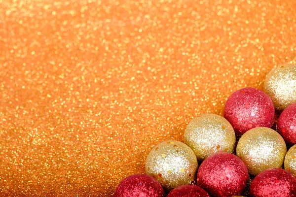 Decorazioni natalizie su sfondo glitter — Foto Stock