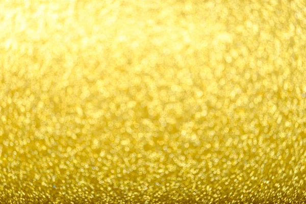 Defocused gold glitter background — Stock Photo, Image