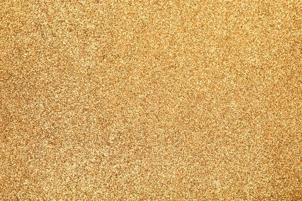 Focado fundo brilho textura dourada — Fotografia de Stock