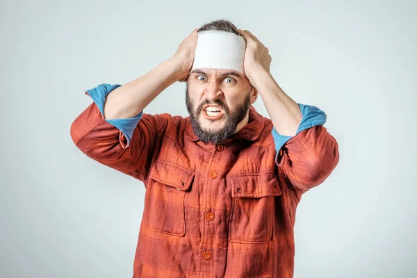 Portrait of man bandaged up