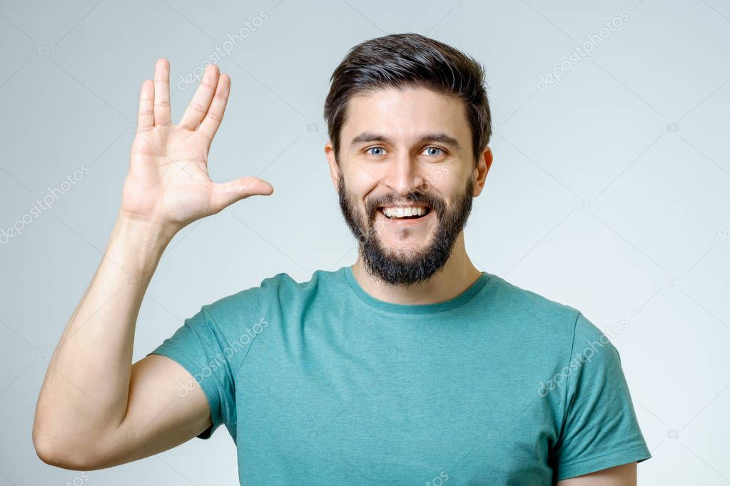 Man making Vulcan salute isolated