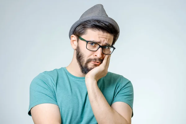 Retrato de un joven con expresión de cara triste — Foto de Stock