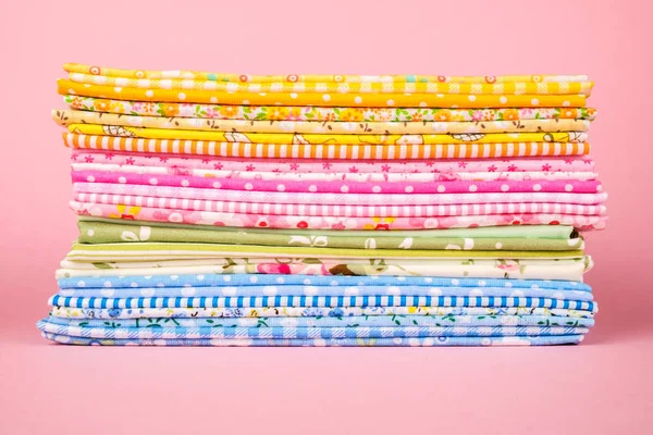 Pile of colorful cloth over colorful background — Stock Photo, Image