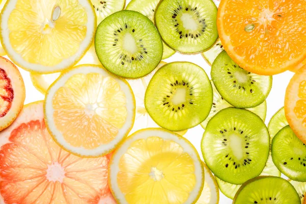 Gyönyörű friss szeletelt vegyes citrusfélék, mint háttér — Stock Fotó