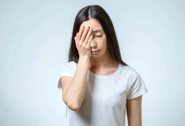 Portrait of depressed woman touching her head — Stock Photo, Image