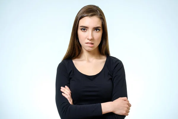 Joven mujer molesta. Aislado sobre fondo blanco — Foto de Stock