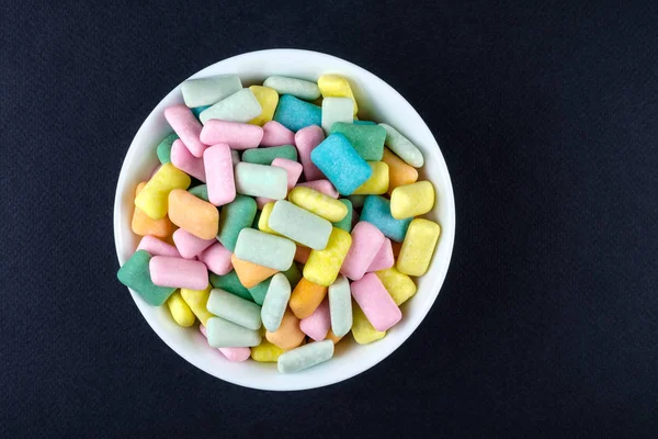 Colored chewing gum in a bowl — Stock Photo, Image