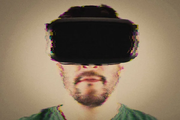 Man in VR-headset over glitch effect