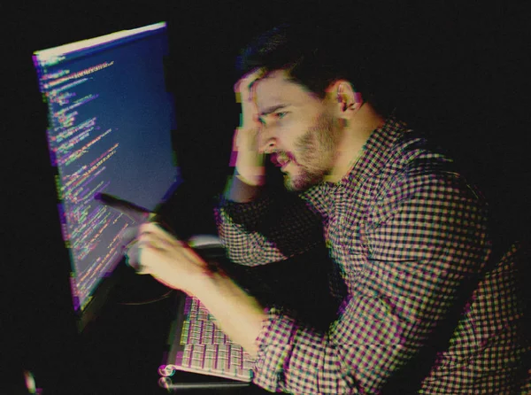 Man working with computer. Glitch effect added — Stock Photo, Image